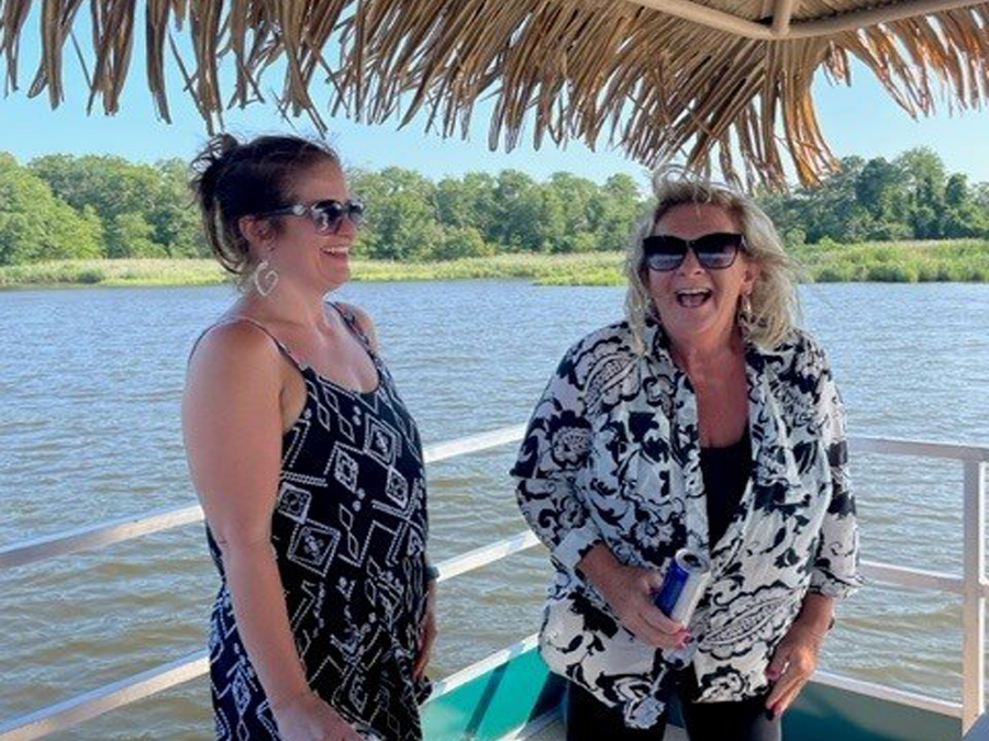 Two women talking on their cruise